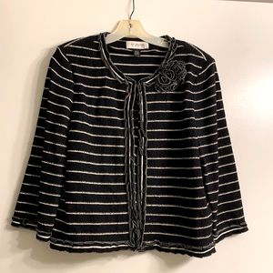 Black and white St John jacket with flower adornment.  Size 14